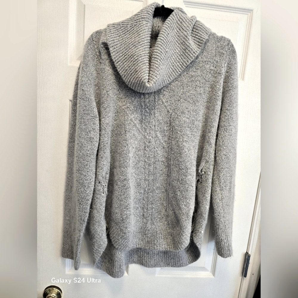 Womans light gray sweater